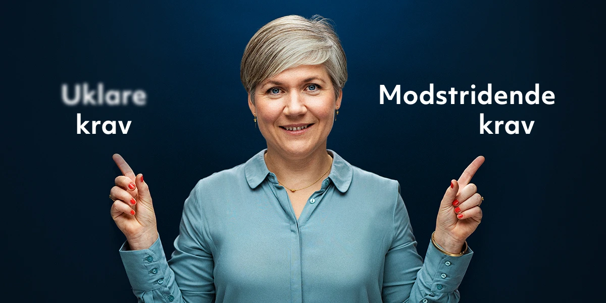 Kvinde peger på to ord "Uklare krav" og "modstridende krav"